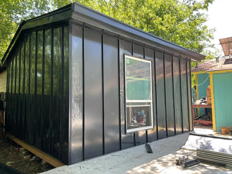 Black standing seam metal wall panels for Metal Roof Installation in Elkhorn